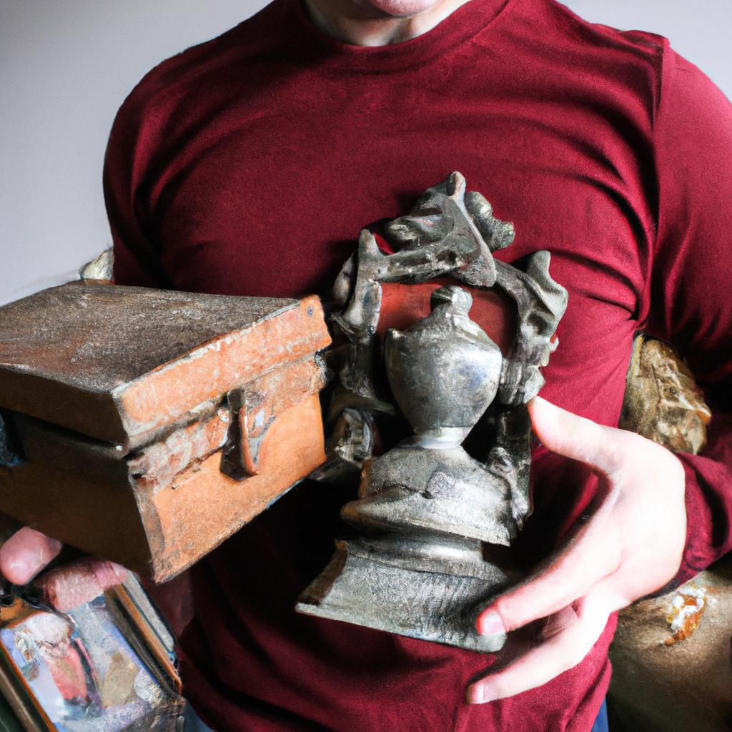 Person holding antique collectibles, auctioning